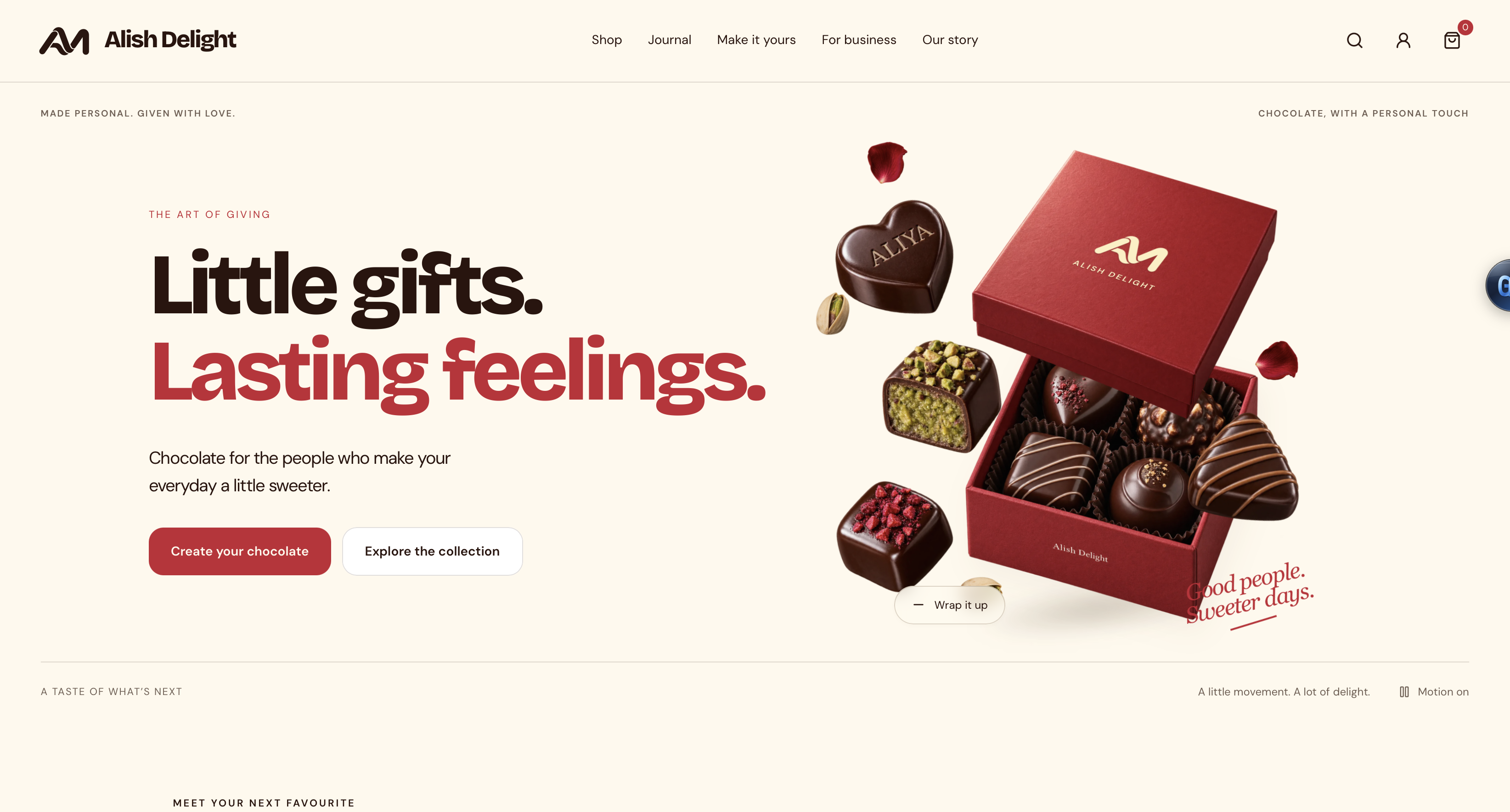 Alish Delight’s ivory and cranberry website, with its AM monogram and an open gift box of personalised chocolates.